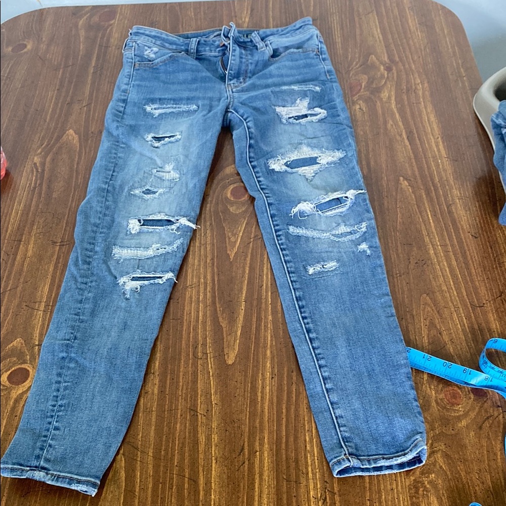 Distressed Blue Jeans